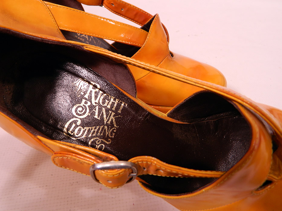 Vintage Mignani Right Bank Clothing Yellow Patent Leather  Platform Shoes. There is gold embossed lettering a "Mignani Made in Italy" designer label in one shoe and "The Right Bank Clothing Co." store label stamped inside the other shoe. 