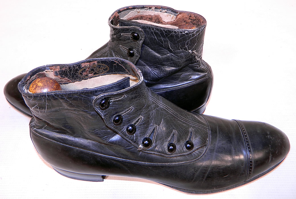 Victorian Vintage Edwin Clapp Shoe Mens Black Leather High Button Boots
They are in good condition, with only some faint scuff marks on the toes, cracked crease marks on the back and the inside top leather lining is flaking, missing in areas. 