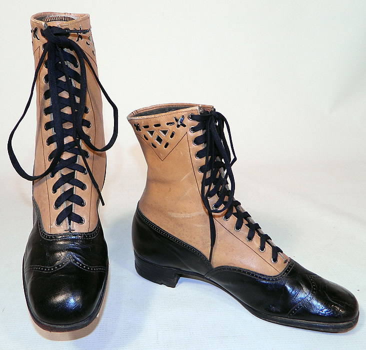 Edwardian Black & Tan Two Tone Leather Lacing Cutouts High Top Boots Shoes
The boots measure 8 inches tall, 10 inches long, 3 inches wide, with 1 inch high heels. These antique boots are difficult to size for today's foot but my guess would be about a size 7 narrow width. 