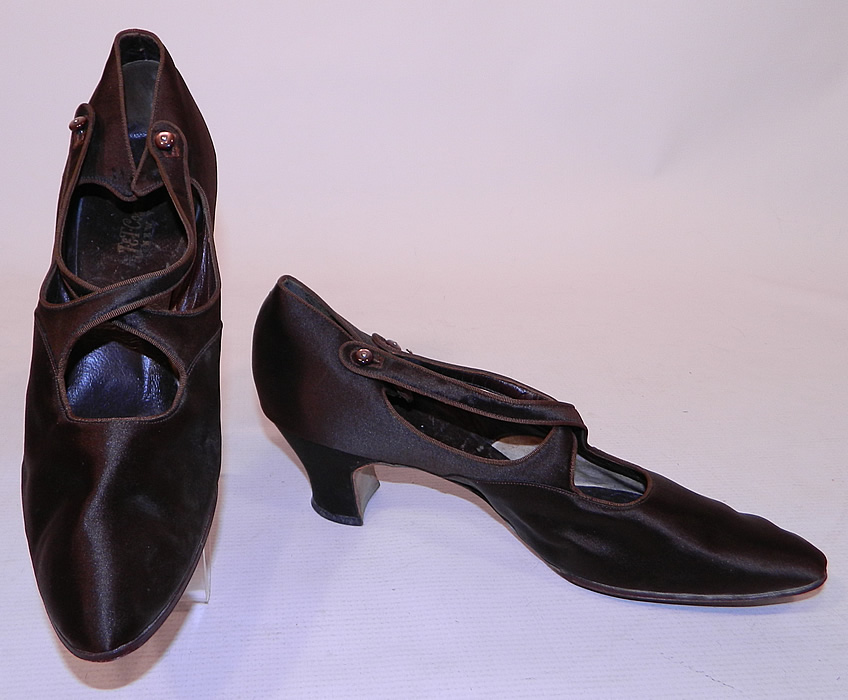 Vintage J&T Cousins Co NY Chocolate Brown Silk Button Strap Mary Jane Shoes
This pair of Edwardian era vintage J&T Cousins Co. New York chocolate brown silk button strap Mary Jane shoes date from 1915.