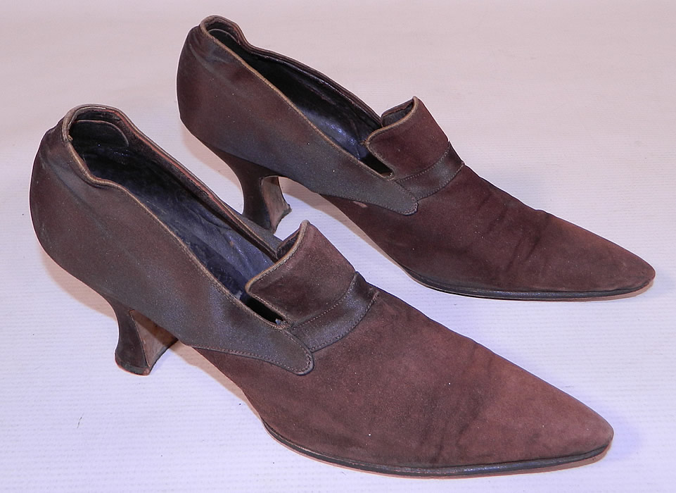 Vintage Chocolate Brown Silk & Suede Leather Pointed Toe Tongue Shoes
This pair of Edwardian era vintage chocolate brown silk and suede leather pointed toe tongue shoes date from 1915. They are made of a dark chocolate brown color two tone silk satin fabric and suede leather.