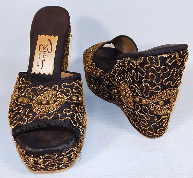 Vintage Ryder of California Black Gold Studded Soutache Wedge Heel Platform Shoes
These sexy backless mule style shoes have a platform lift front, open toes, a wedge high heel and have "Ryder of California" label on the insoles.