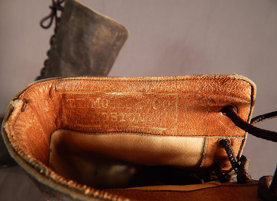 Victorian T.E. Mosely Co Gray Suede Black Leather High Top Lace-up Boots Shoes
They are stamped inside the leather trimmed tops "T.E. Mosely Co. Boston" in gold embossed lettering and marked a size 6 1/2 AA. 