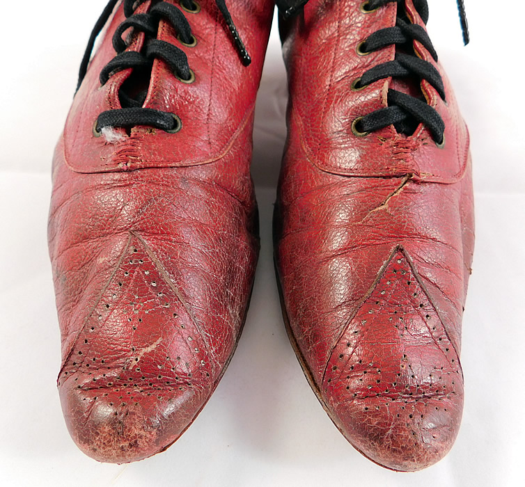 Victorian Rosenbloom Maker Red Leather Pointed Toe Low Lace-up Shoes
The shoes measure 9 1/2 inches long, 2 1/2 inches wide and have a 1 1/2 inch high heel.