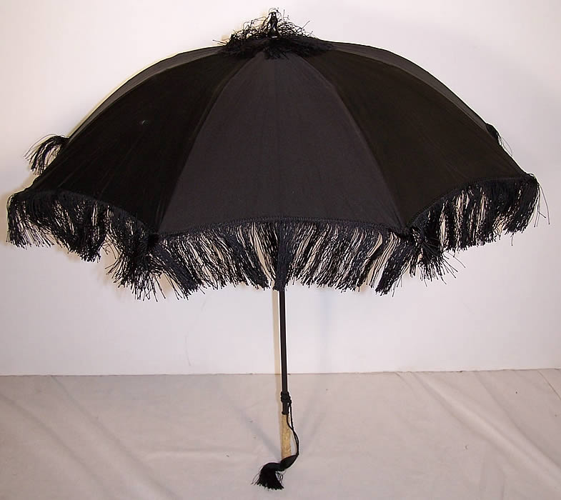 Victorian Black Silk Mourning Parasol Dragon Carved Handle Side View.