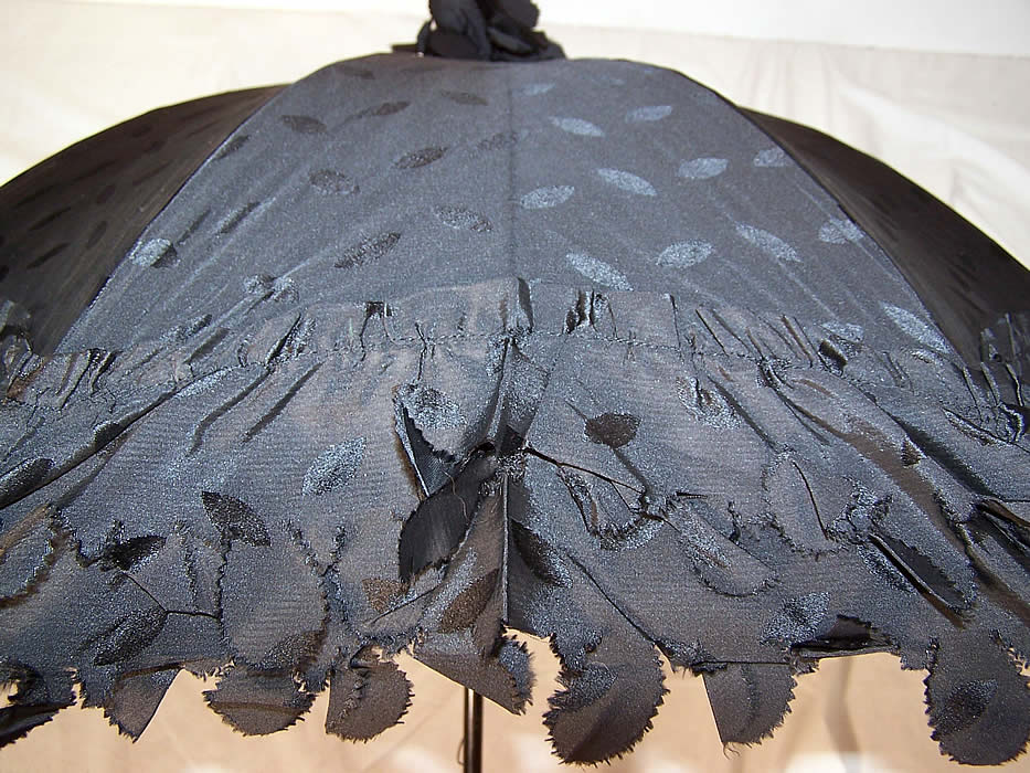 Edwardian Black Silk Ebony Wood Carved Handle Parasol side view.