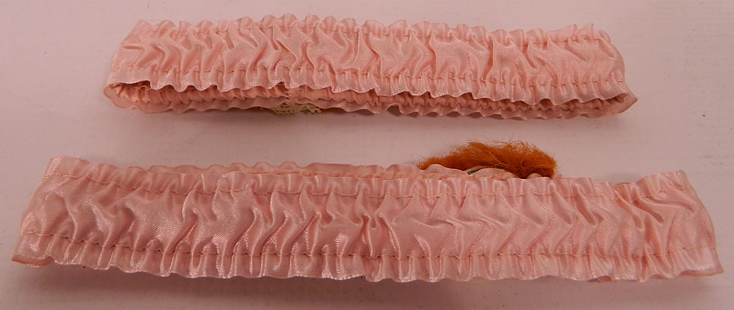 Unworn Vintage Pink Silk Hand Painted Red Head Flapper Girl Garters back view. They are in good unworn condition. These are truly a rare find and a wonderful piece of wearable art! 