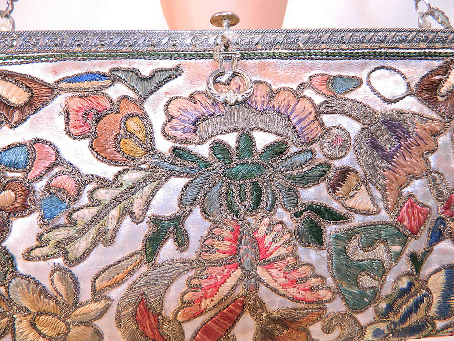 Vintage Art Deco Floral Stumpwork Embroidered Silver Leather Evening Purse. It is in good condition, with only some wear to the silver leather which has rubbed off in areas. This is truly a wonderful piece of embroidered textile art! 