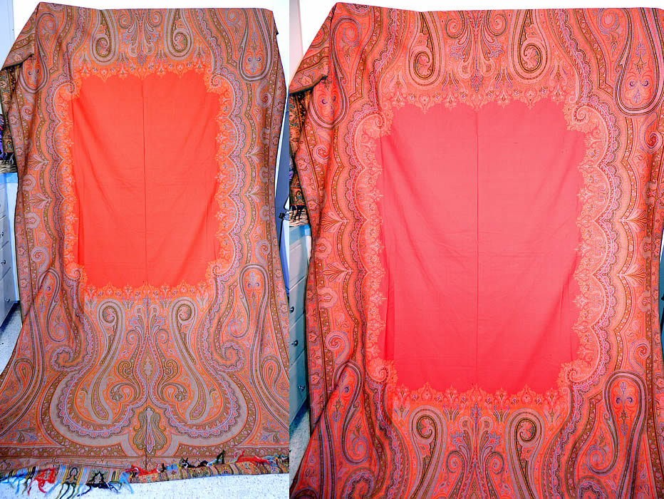 Victorian Antique Large Banquet Size Jacquard Hand Loom Red Wool Paisley Shawl. This Victorian era antique large banquet size jacquard hand loom red wool paisley shawl dates from the 1880s. It is made of jacquard hand loomed woven wool done in strong bright vivid vibrant colors predominantly red. 