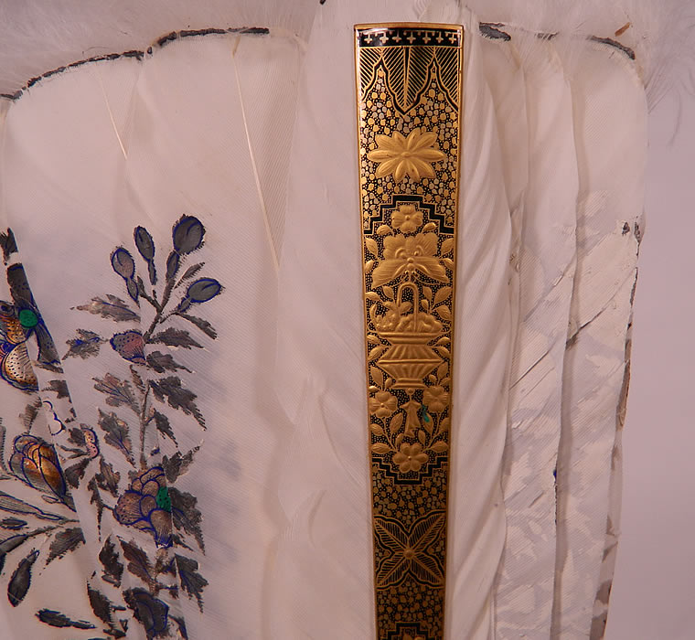 Antique Chinese Hand Painted Silver Leaf Feathers Gold Lacquer Fan & Box. The fan measures 12 inches long and 24 inches wide when opened. It is in good condition, with a few small frays breaks along the painted feathers 