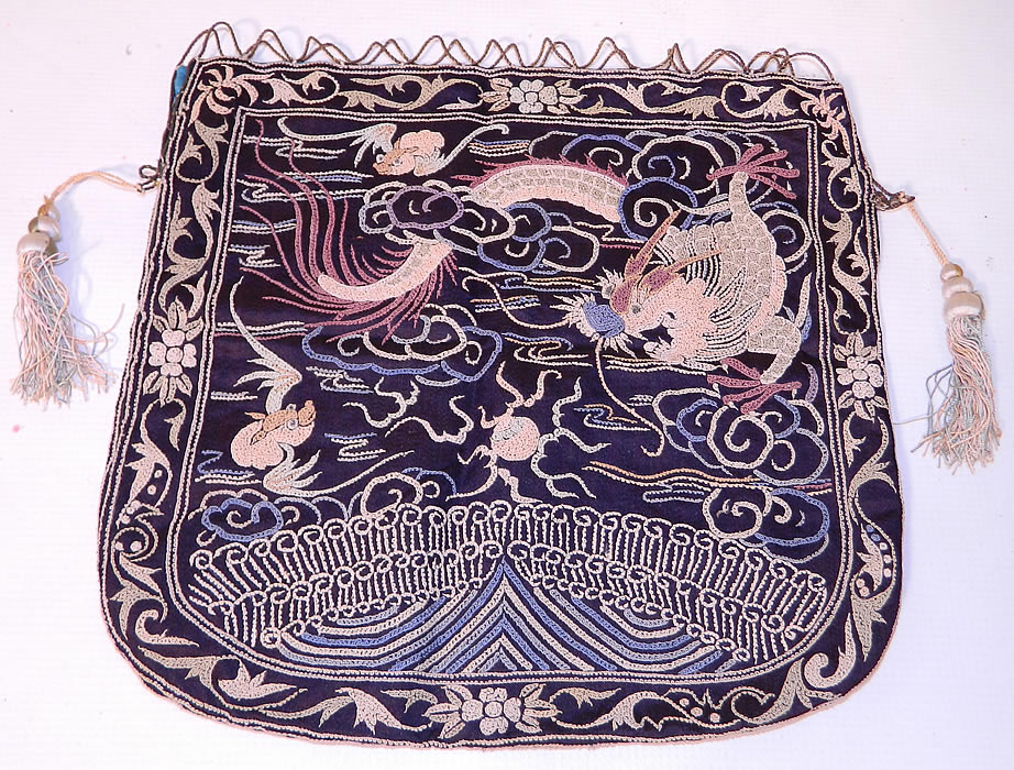 Antique Chinese Silk Embroidered Forbidden Stitch Dragon Bat Badge Purse. This antique Chinese silk embroidered forbidden stitch dragon bat badge purse dates from the early 1900s towards the end of the Qing Dynasty. The badge square is made of a black silk background, with colorful intricately done forbidden stitch and Pekinese stitch hand embroidery work. 