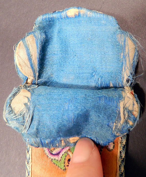 Antique Chinese Orange Silk Peking Stitch Embroidery Bat Swastika Fan Case Holder Purse. It is lined in blue silk with a woven braided trim edging. The case measures 12 inches long and is 2 1/4 inches wide at the top and 1 1/2 inches wide at the bottom. It is in good condition, with only some fraying of the silk fabric lining. This is truly a wonderful piece of antique Chinese textile art!