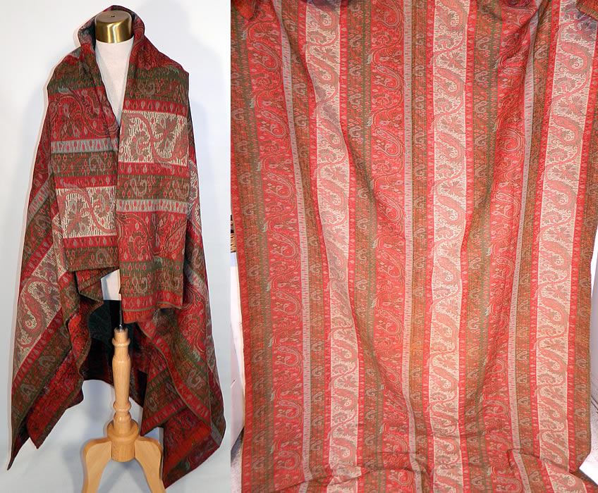 Victorian Antique Jacquard Hand Loom Wool Paisley Striped Shawl Banquet Size. This Victorian era antique jacquard hand loom wool paisley striped shawl banquet size dates from the late 19th century. It is made of jacquard hand loomed woven wool done in strong bright vivid vibrant colors of red, green, turquoise blue and white. 