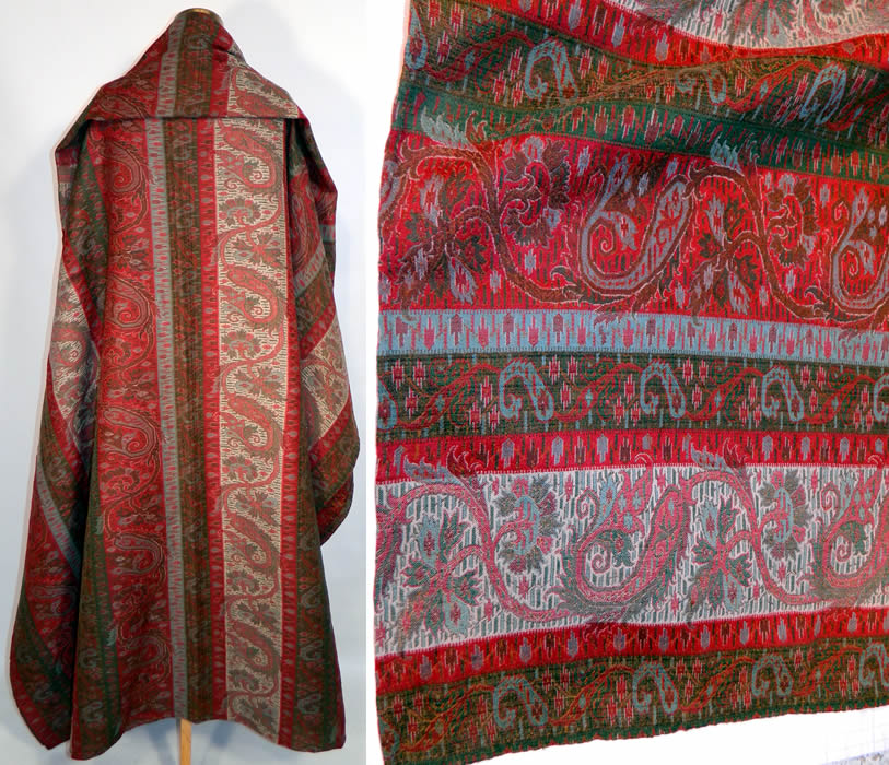 Victorian Antique Jacquard Hand Loom Wool Paisley Striped Shawl Banquet Size. These paisley shawls were made in Kashmir, Persia, India and Europe in Scotland at Paisley itself. This stunning shawl has wonderful workmanship and detail with a colorful striped floral leaf, boteh tear drop shape design and green selvage along the side edgings. 