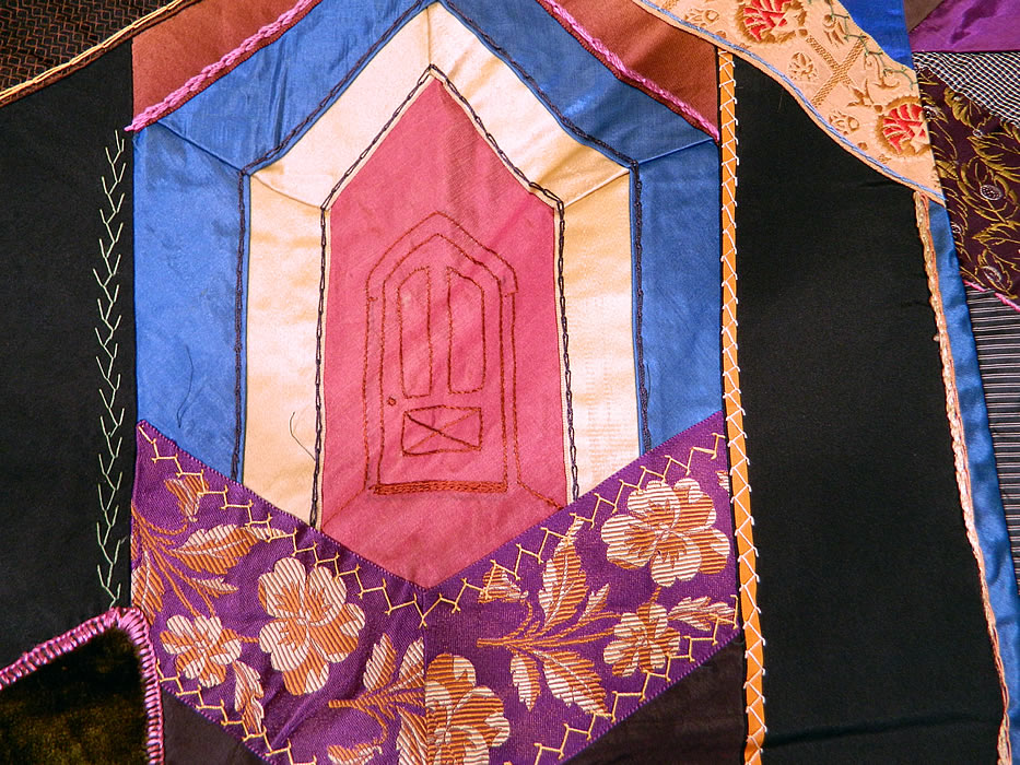 Victorian Antique Silk Embroidered Fancy Needlework Applique Crazy Quilt 
There is an iridescent green silk fabric backing with red trim binding edging. 