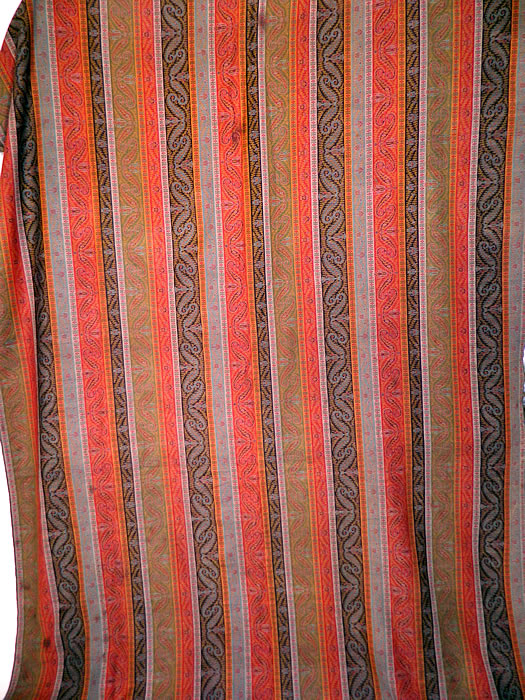 Victorian Antique Jacquard Hand Loom Wool Paisley Striped Shawl Banquet Size
This Victorian era antique jacquard hand loom wool paisley striped shawl banquet size dates from the late 19th century. It is made of jacquard hand loomed woven wool done in strong bright vivid vibrant colors of red, green, orange, turquoise blue, black and white.