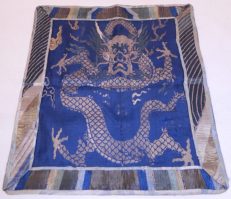 Antique Chinese Silk Damask Weave Brocade Fabric Mangpao Dragon Square Badge Textile
This antique Chinese silk damask weave brocade fabric Mangpao dragon square badge textile dates from the early 19th century during the Qing Dynasty.