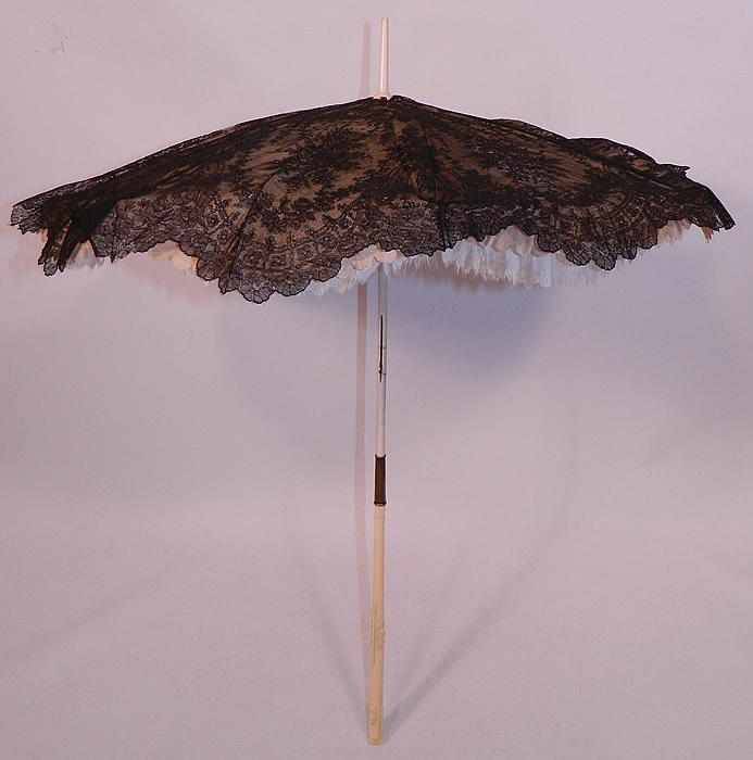 Victorian Civil War Antique Black Chantilly Lace Carved Roses Folding Handle Parasol
This is truly a rare and wonderful antique Victoriana parasol! 