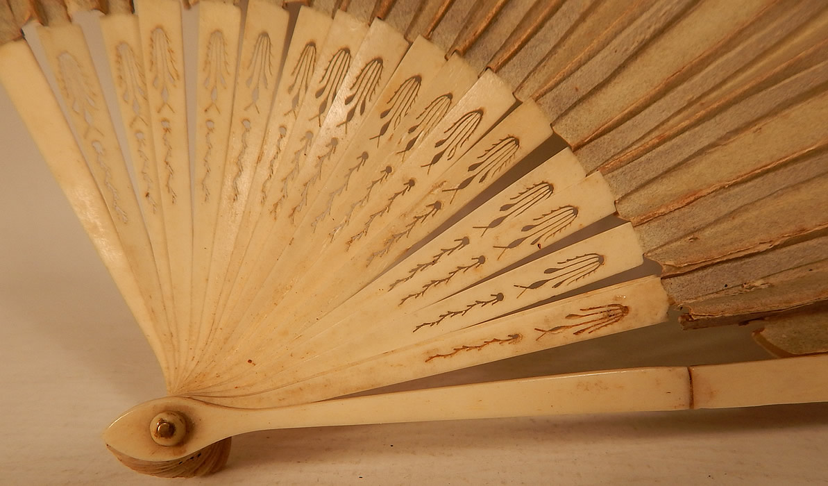 Antique 18th Century Hand Painted Paper Sequin Pierced Carved Folding Fan & Box
This fabulous folding fan has a carved and pierced bone sticks and guards and rivet holding the fan together at the bottom. 